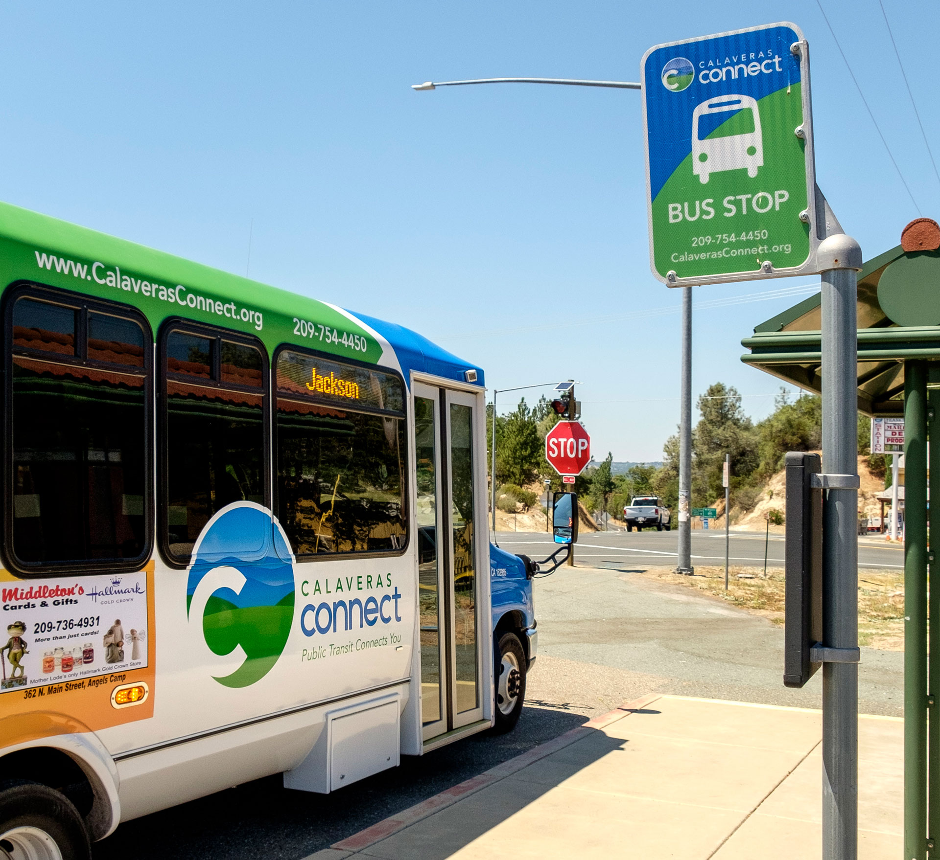 Bus and bus stop sign